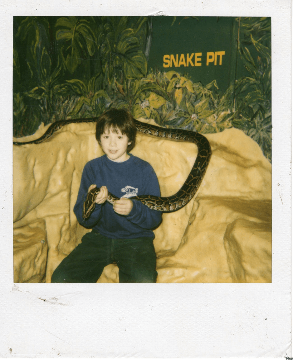 David as a boy, holding a snake